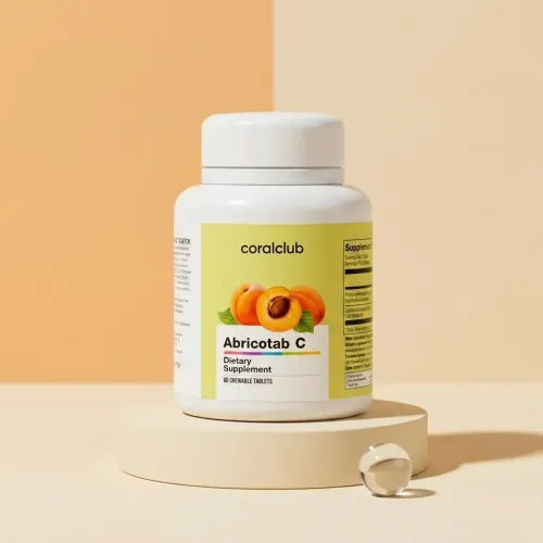 Packshot Abricotab C, cu imagini de caise și o tabletă masticabilă.