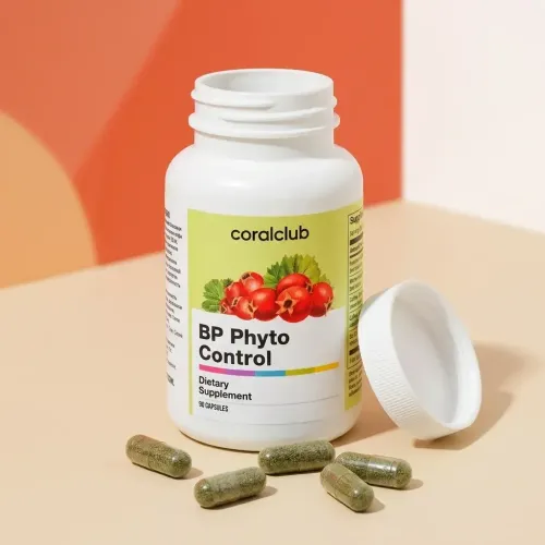 Flaconul BP Phyto Control cu capsule verzi și capac alb, pe suprafață bej.