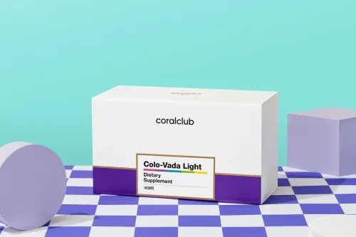 Cutia Colo-Vada Light pe o suprafață în carouri violet